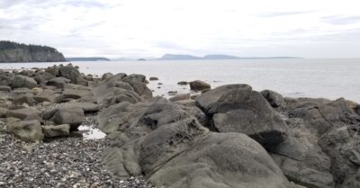 Large rocks along beach shoreline